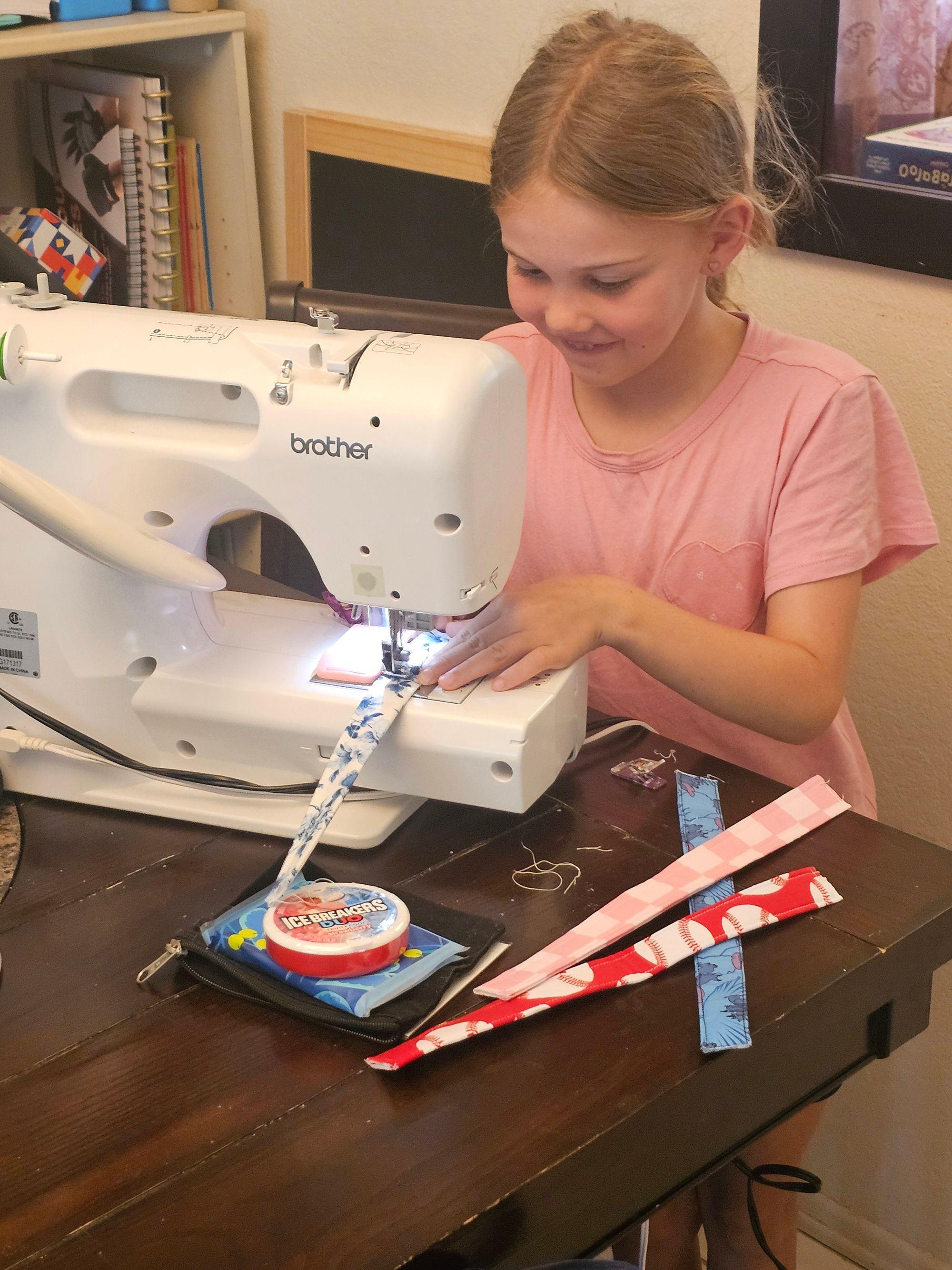 Reagan at work at her sewing machine